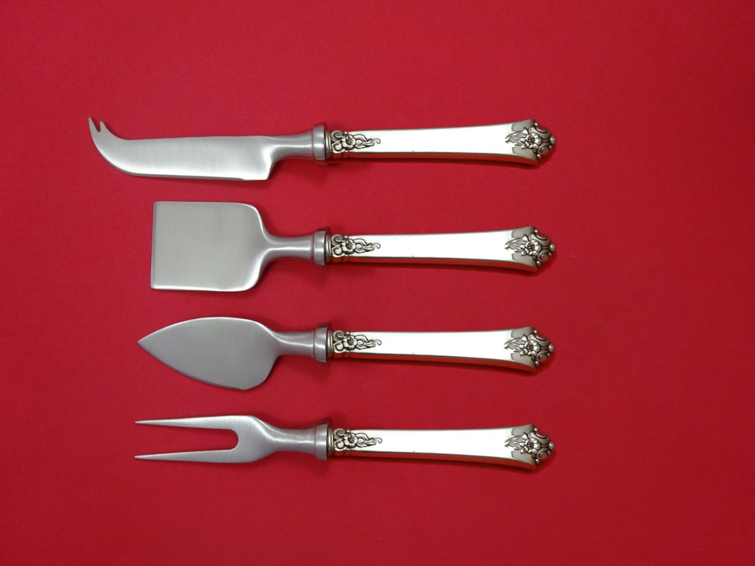 Castle Rose Royal Crest Sterling Silver 4pc Cheese Serving Set: Castle Rose Royal Crest Sterling Silver 4pc Cheese Serving Set Indulge in the elegance of the Castle Rose by Royal Crest Sterling Silver Cheese Serving Set. This exquisite 4-piece hostess set features