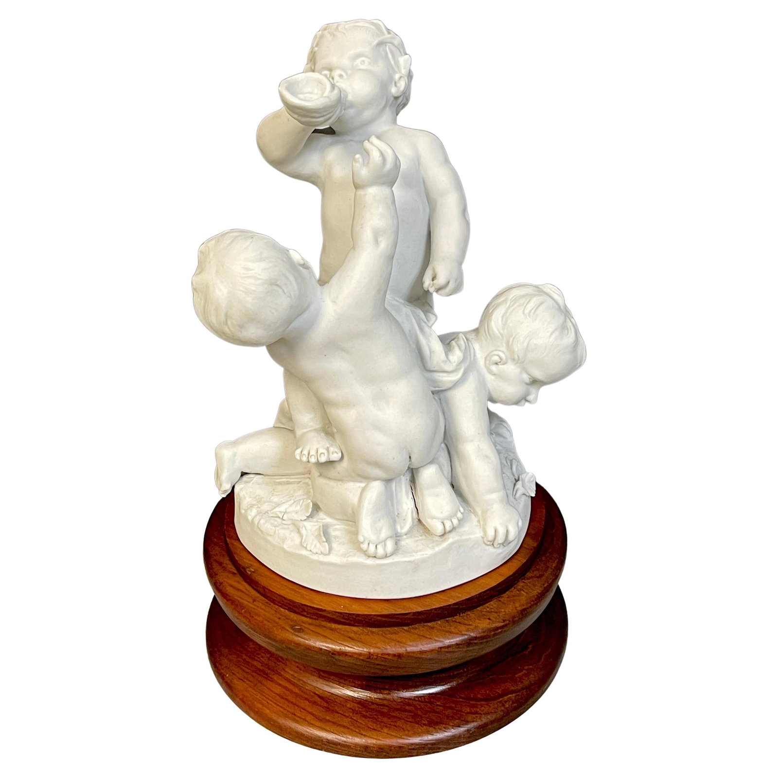 19th Century Sevres Porcelain Biscuit Group of Three Puttos 1884: 19th Century Sevres Porcelain Biscuit Group of Three Puttos 1884 This exquisite 19th Century Sevres biscuit group features three frolicking puttos, showcasing the intricate artistry of the era. Crafte