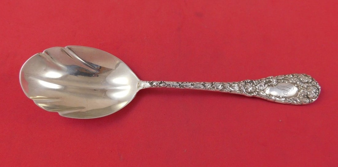 Durgin Chrysanthemum Sterling Silver Preserve Spoon 8 1/4 Unique Fluted Design: Durgin Chrysanthemum Sterling Silver Preserve Spoon 8 1/4 Unique Fluted Design This elegant serving spoon, crafted by Durgin in the exquisite Chrysanthemum pattern, features a unique fluted bowl desig