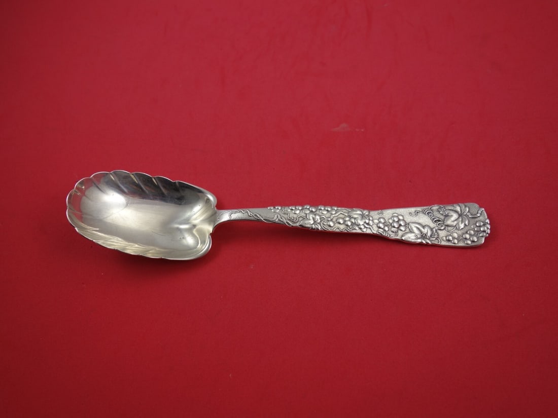 Tiffany Vine Sterling Silver Berry Spoon Leaf Bowl with Certificate: Tiffany Vine Sterling Silver Berry Spoon Leaf Bowl with Certificate This exquisite Berry Spoon from the Vine pattern by Tiffany & Co. showcases a stunning leaf-shaped bowl and a handle adorned with a 