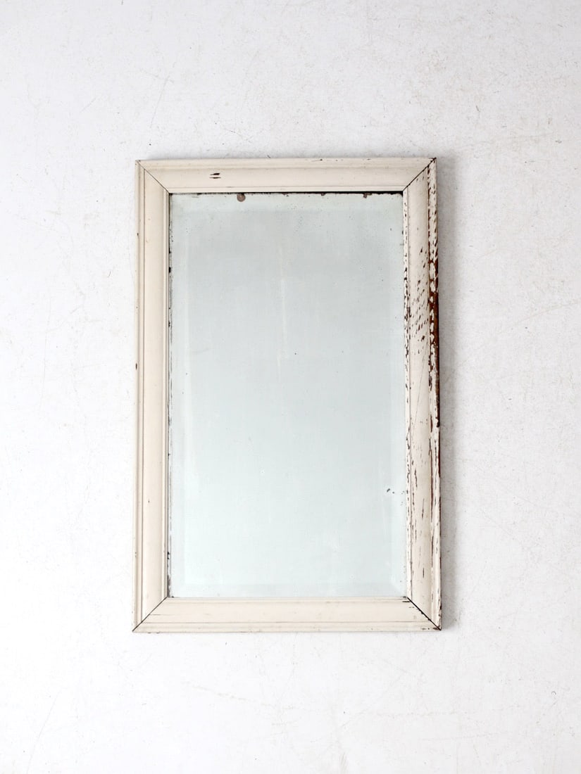 Antique Beveled Glass Mirror Cream Wood Frame Vintage Charm: Antique Beveled Glass Mirror Cream Wood Frame Vintage Charm This antique beveled glass mirror showcases a stunning cream wood frame with beautifully aged paint, adding a touch of vintage charm to any 