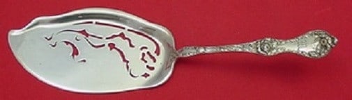 Les Cinq Fleurs Reed & Barton Sterling Silver Ice Cream Server 10 Inch: Les Cinq Fleurs Reed & Barton Sterling Silver Ice Cream Server 10 Inch Elevate your dessert presentations with the exquisite Les Cinq Fleurs Ice Cream Server by Reed & Barton. This elegantly designed 