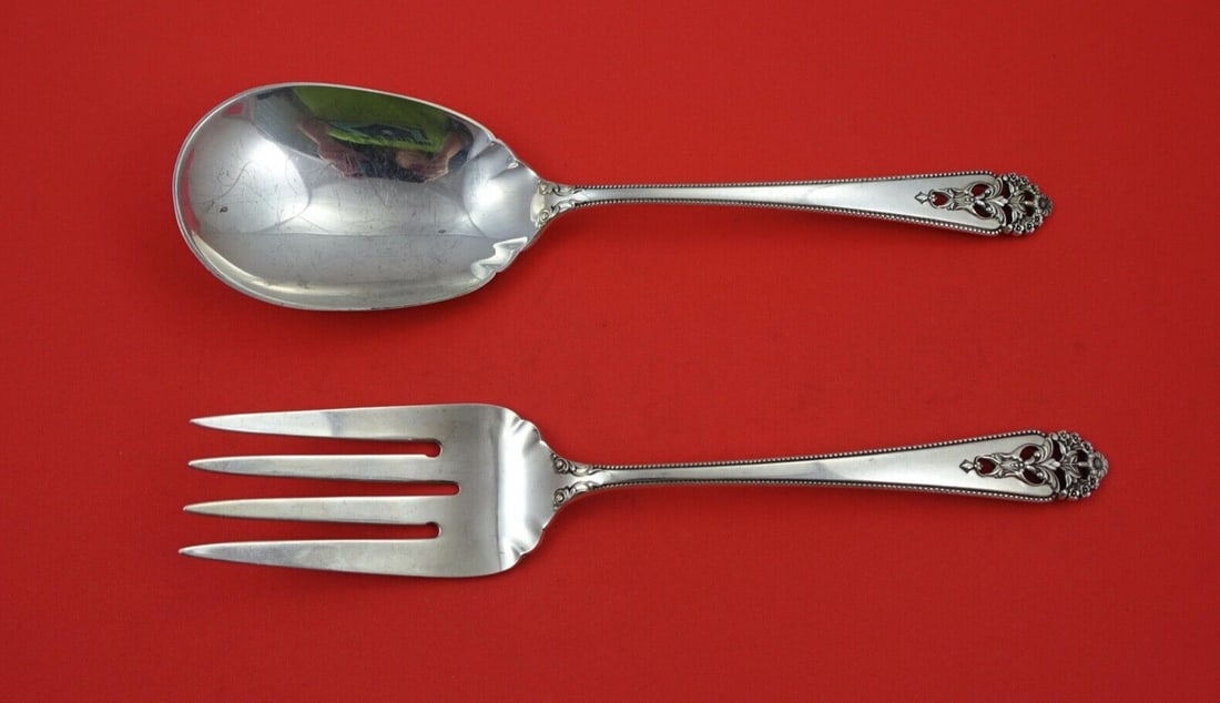 International Silver Queens Lace Salad Serving Set 9 1/8 inches: International Silver Queens Lace Salad Serving Set 9 1/8 inches This exquisite salad serving set features the elegant Queens Lace pattern by International Sterling, crafted from high-quality sterling 