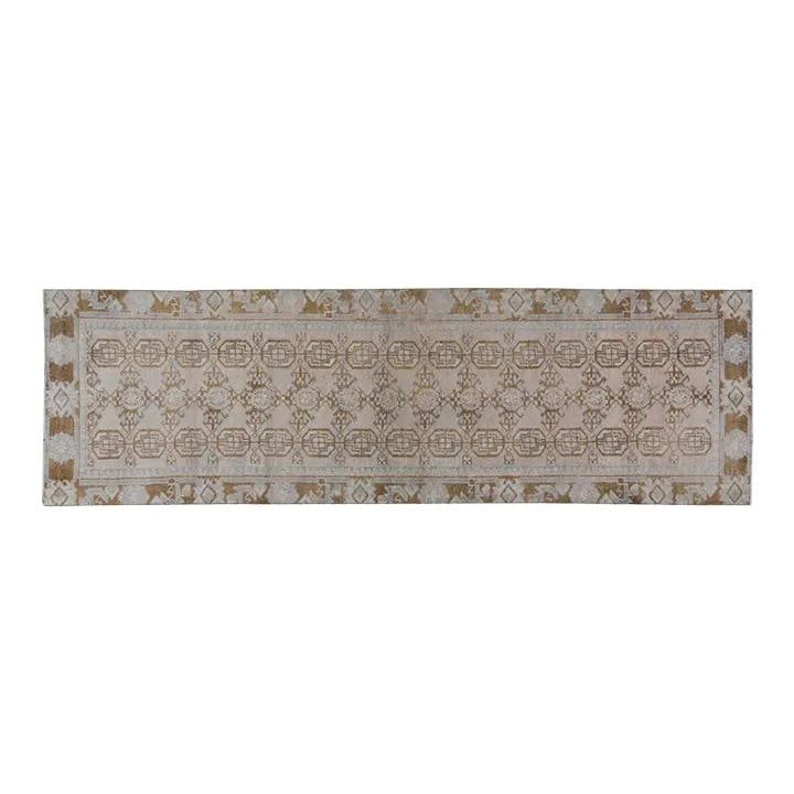 Hand-Knotted Wool Turkish Runner Rug 3'x10'3" Tan Vintage: Hand-Knotted Wool Turkish Runner Rug 3'x10'3" Tan Vintage This vintage Turkish wool rug is hand-knotted using traditional techniques, offering a blend of classic craftsmanship and contemporary style. 