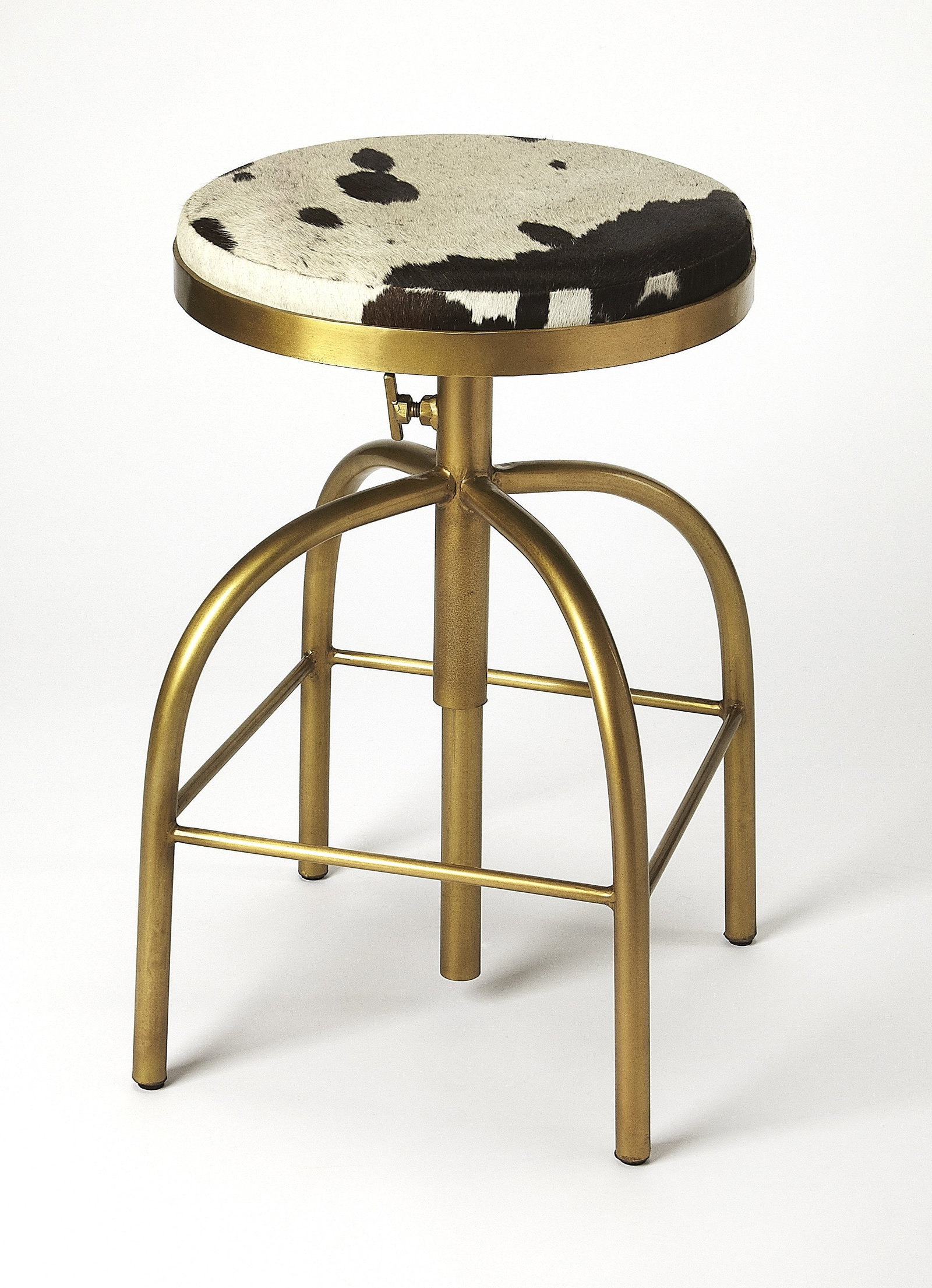 Butler Grogan 26 Inch Swivel Bar Stool with Hair-On-Hide Finish: Butler Grogan 26 Inch Swivel Bar Stool with Hair-On-Hide Finish Introducing the Grogan Swivel Bar Stool, a perfect fit for rustic and industrial-themed spaces. This meticulously crafted stool features