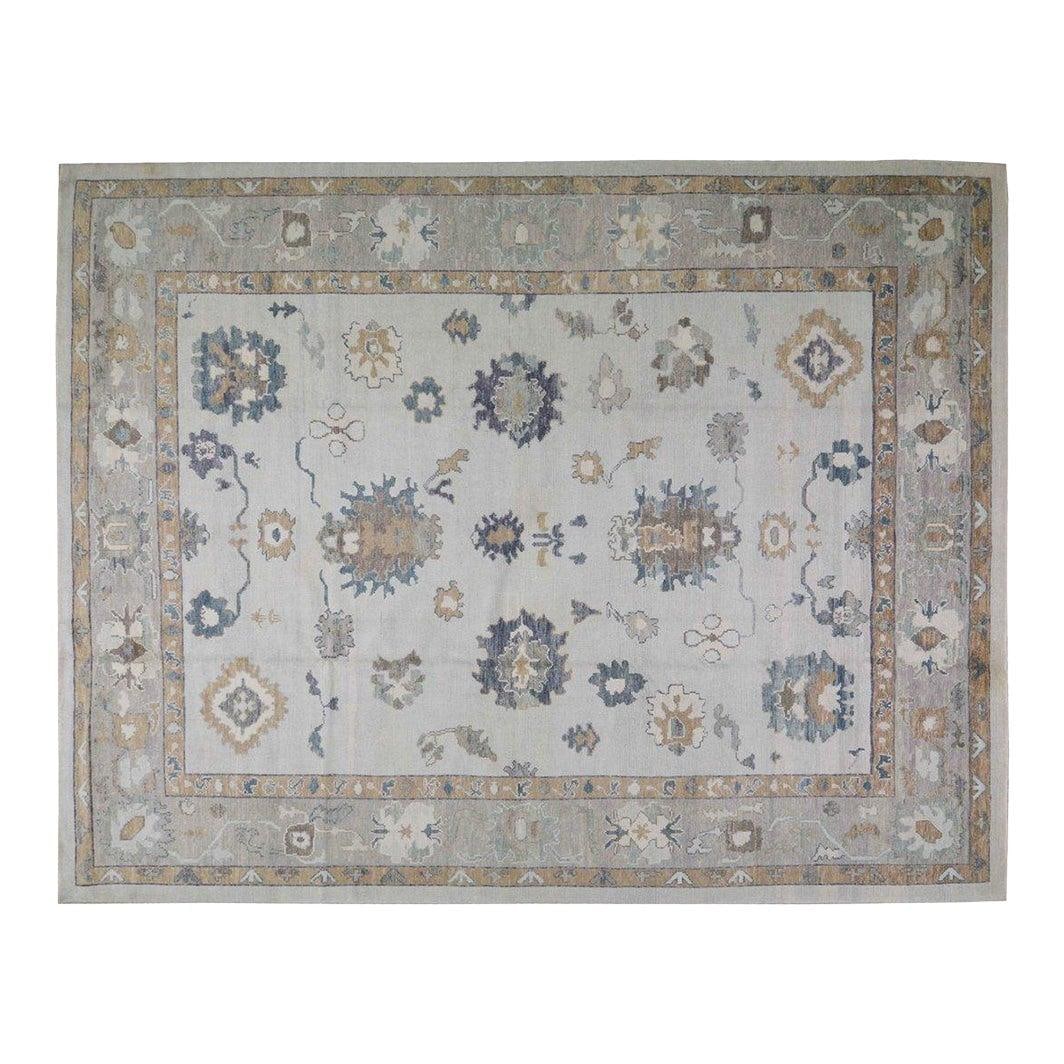 Slate Gray Hand-Knotted Wool Oushak Rug 10'5'' x 13'6'': Slate Gray Hand-Knotted Wool Oushak Rug 10'5'' x 13'6'' This hand-knotted Turkish Oushak wool rug features traditional craftsmanship combined with a modern design sensibility. Carefully constructed us