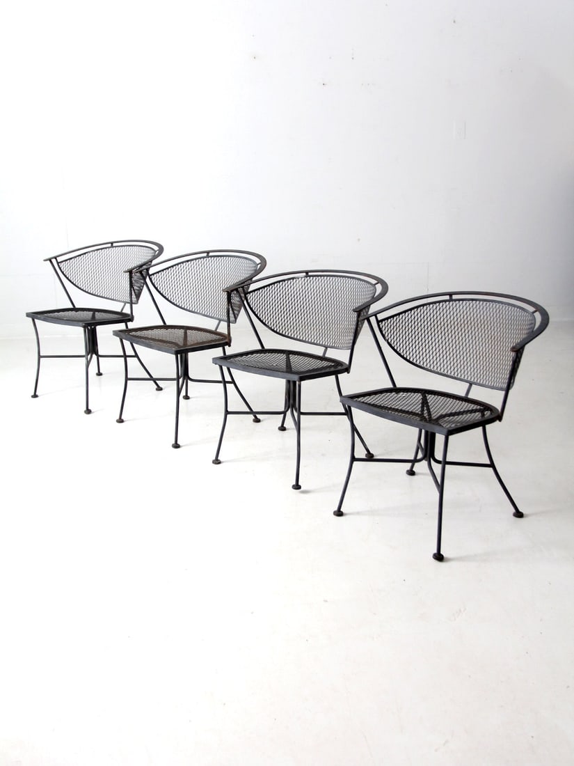 Classic Set of 4 Vintage Wrought Iron Patio Chairs: Classic Set of 4 Vintage Wrought Iron Patio Chairs Enhance your outdoor space with this set of four vintage wrought iron patio chairs. Each chair features a classic design with a gracefully curving ba