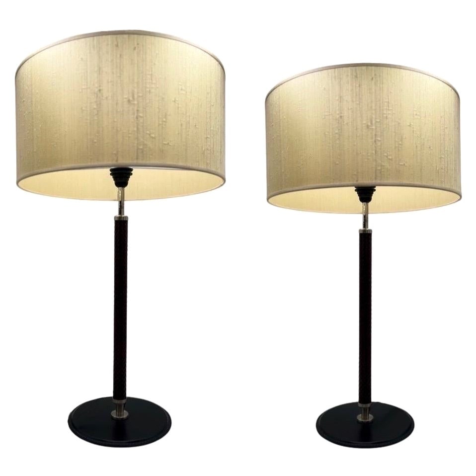 Set of 2 Natuzzi Ludovica Leather Wrapped Table Lamps Italy: Set of 2 Natuzzi Ludovica Leather Wrapped Table Lamps Italy Illuminate your space with this elegant pair of Arte Flash for Natuzzi "Ludovica" Leather Wrapped Table Lamps. Each lamp features a stylish 