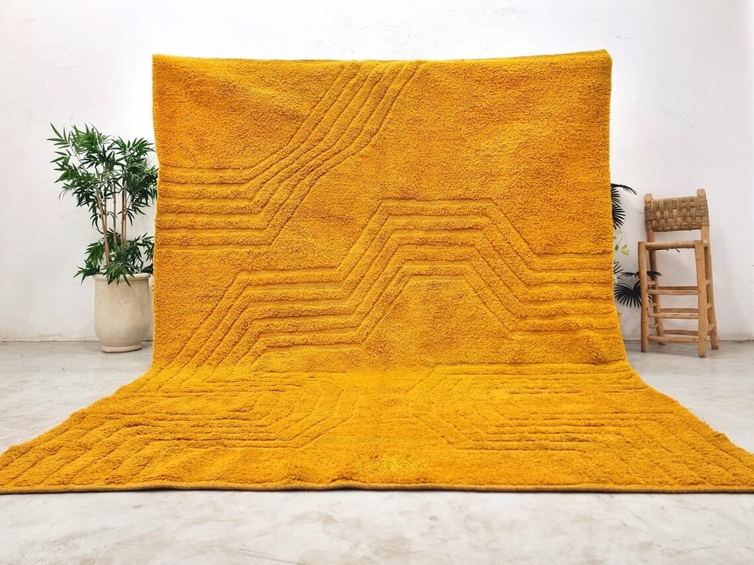 Handmade Orange Wool Rug from Morocco 8 x 5 Feet: Handmade Orange Wool Rug from Morocco 8 x 5 Feet Experience the elegance of this Luxury Soft Engraved Orange Handmade Wool Rug, expertly handwoven in the Atlas Mountains by skilled local Berber women 