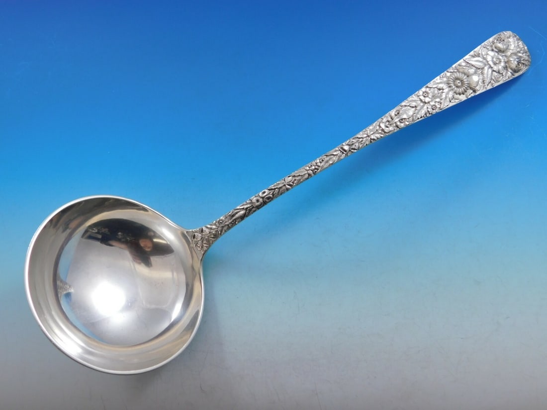 Kirk Repousse Sterling Silver Soup Ladle 13 1/2 Vintage 10.15 Mark: Kirk Repousse Sterling Silver Soup Ladle 13 1/2 Vintage 10.15 Mark This impressive vintage soup ladle from Kirk showcases the exquisite Repousse pattern, renowned for its intricate floral design. Meas