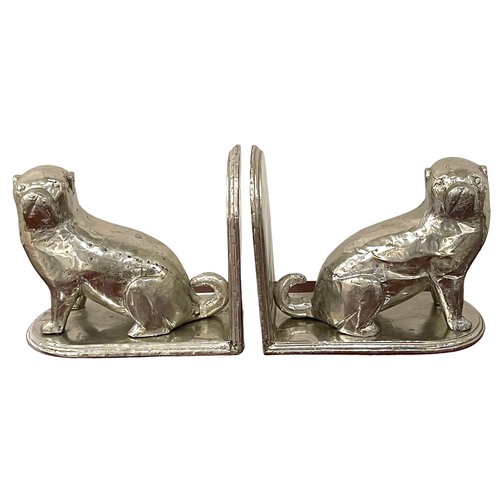 Vintage American Folk Art Tin Clad Pug Dog Bookends Set of 2: Vintage American Folk Art Tin Clad Pug Dog Bookends Set of 2 This charming pair of American Folk Art Tin Clad Pug Dog bookends is a delightful addition to any collection. Crafted in the 1940s, these b
