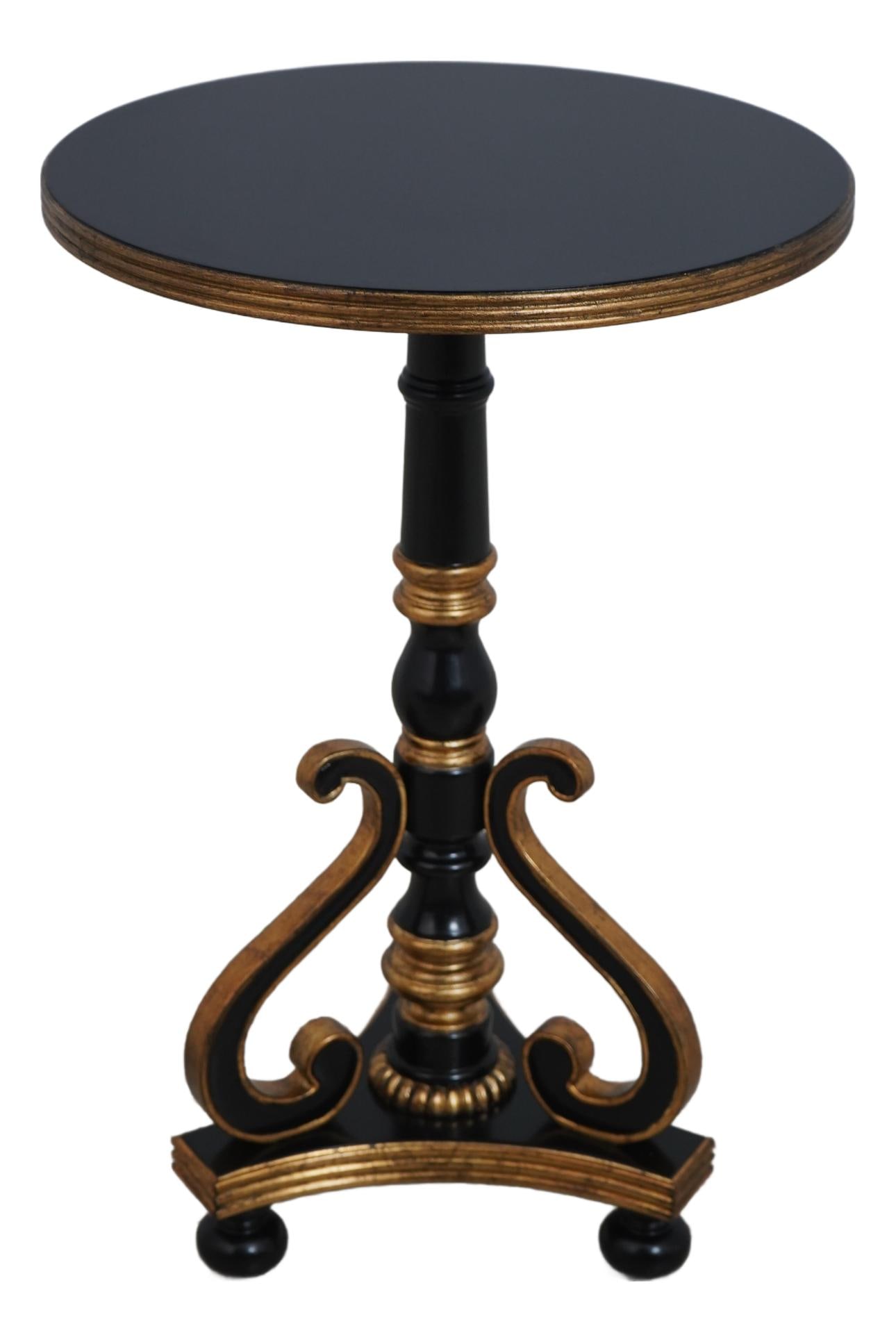 Maitland Smith 8132-30 Accent Table Black Wood Gold Accents: Maitland Smith 8132-30 Accent Table Black Wood Gold Accents This elegant Maitland Smith accent pedestal table features a beautifully scrolled pedestal base and is finished in a rich ebony with gold gi