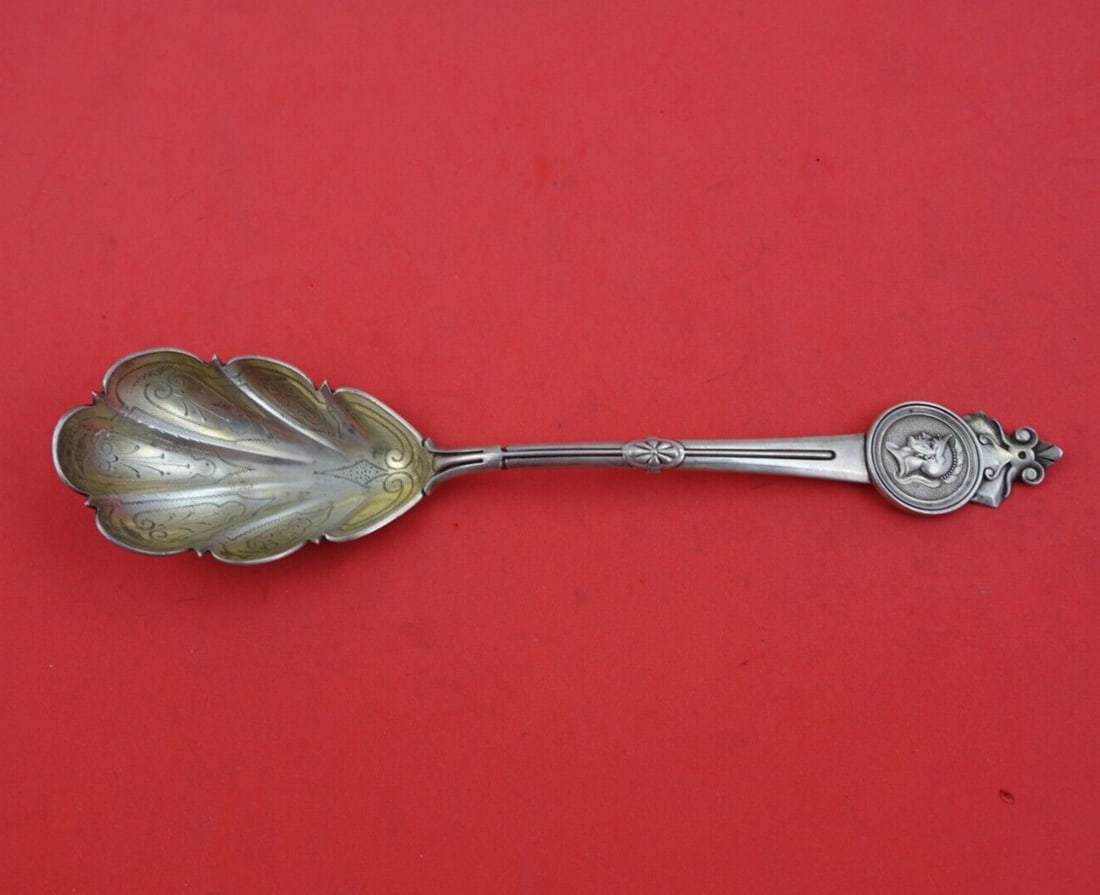 Gorham Medallion Sterling Silver Berry Spoon Bright-Cut Shell Bowl 8.5": Gorham Medallion Sterling Silver Berry Spoon Bright-Cut Shell Bowl 8.5" This exquisite serving spoon from Gorham, part of the Medallion pattern, showcases a bright-cut shell bowl design. Crafted from 