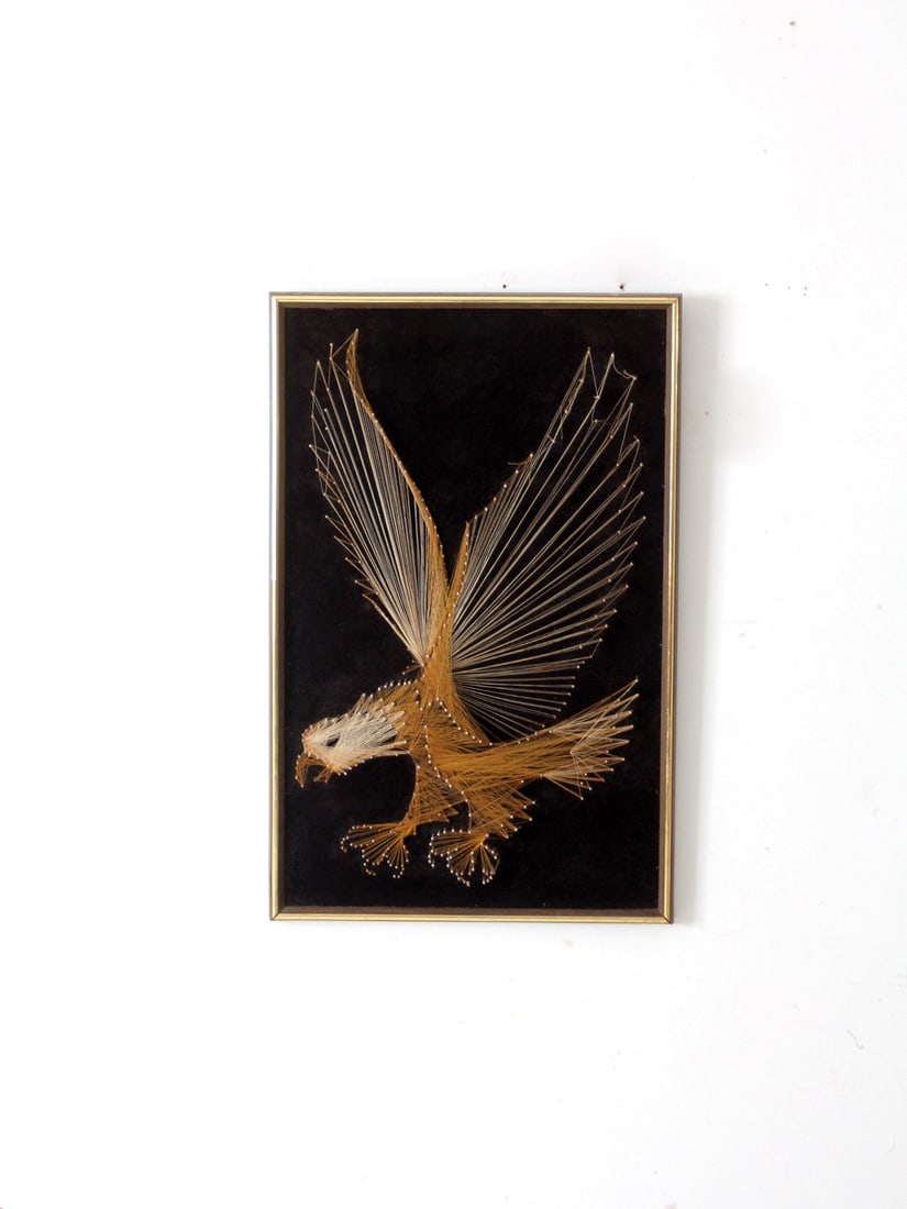 Vintage 70s American Eagle String Art on Black Velvet: Vintage 70s American Eagle String Art on Black Velvet Capture the essence of 70s Americana with this impressive vintage string art wall hanging, showcasing a majestic eagle crafted with golden, white,