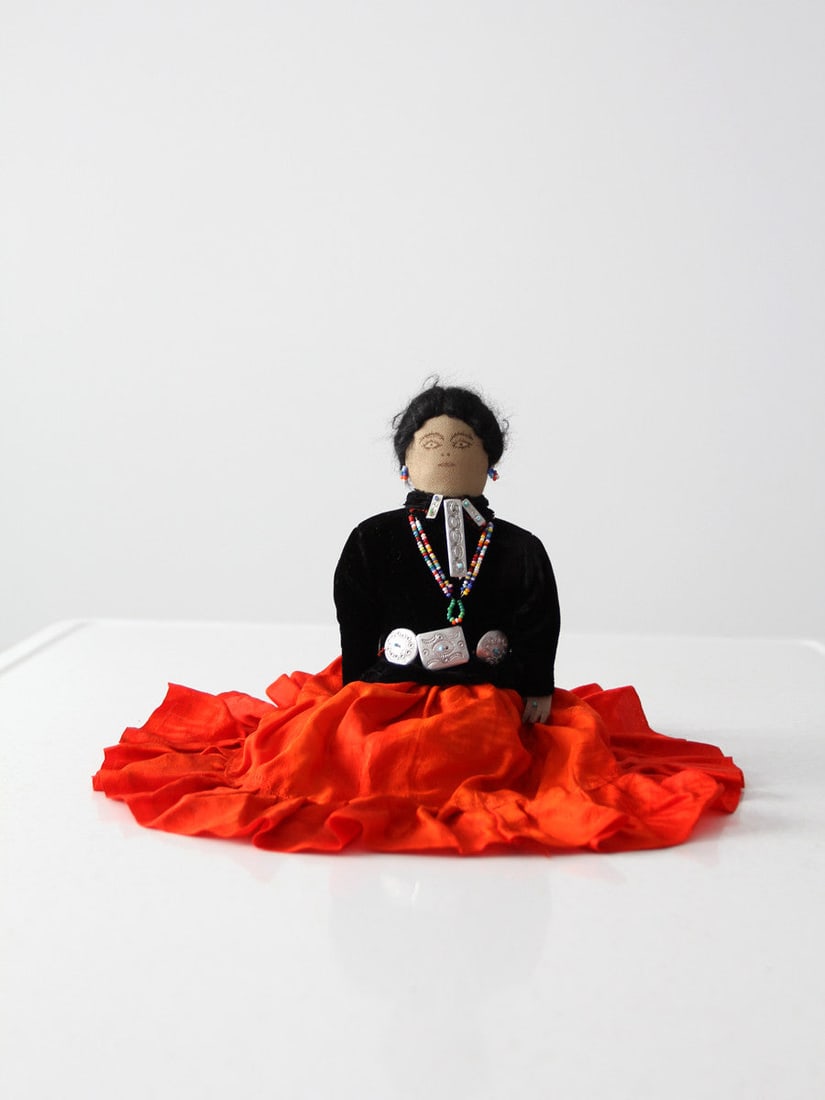Vintage Navajo Doll 12 Inch Painted Cloth Face Beaded Jewelry: Vintage Navajo Doll 12 Inch Painted Cloth Face Beaded Jewelry This vintage Native American doll showcases traditional craftsmanship with a painted cloth face and intricately designed clothing. The dol
