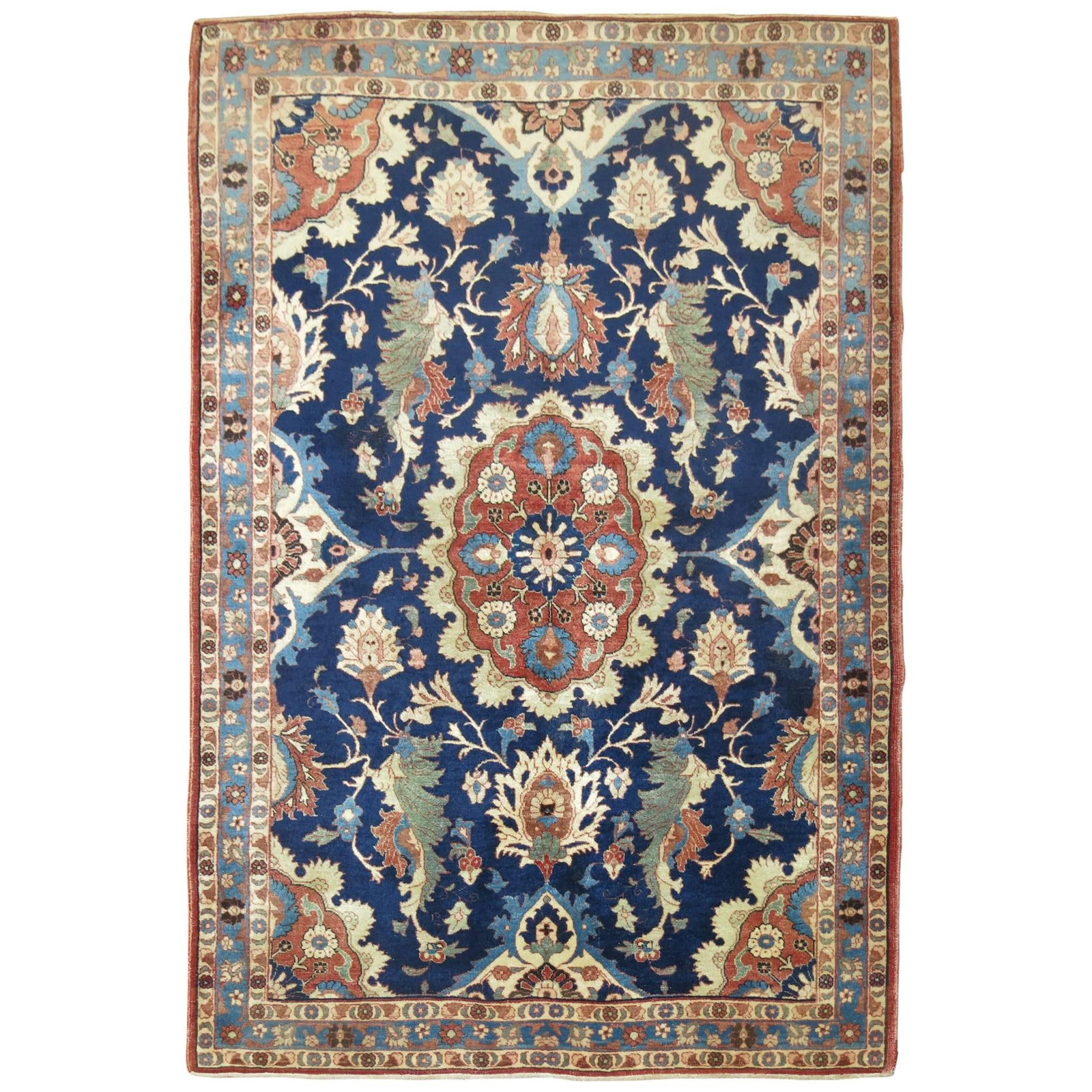Zabihi Collection 20th Century Persian Isfahan Hand-Woven Carpet 42 x 57: Zabihi Collection 20th Century Persian Isfahan Hand-Woven Carpet 42 x 57 This exquisite Persian Isfahan carpet showcases a beautiful navy blue field adorned with accents in green and brown. Perfectly 