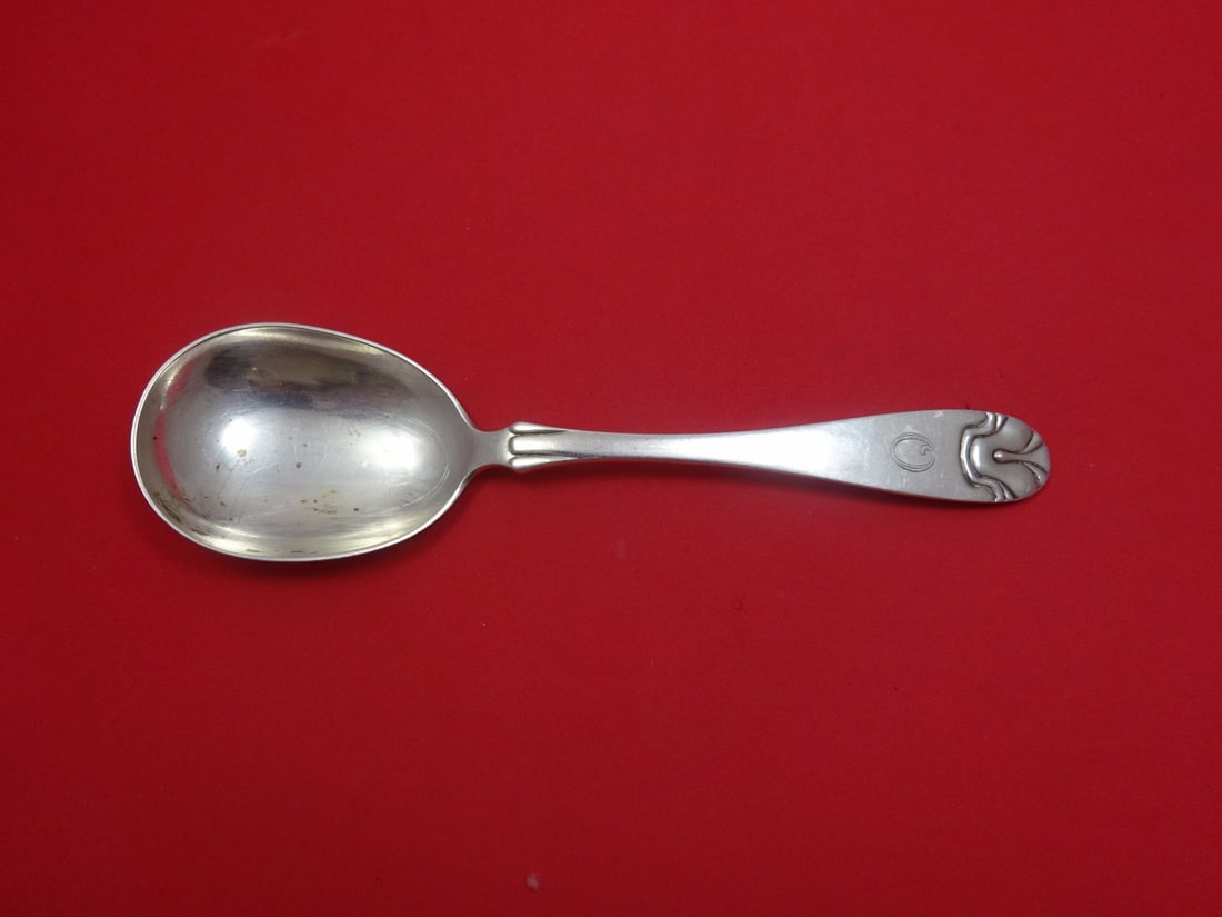 J. Tostrup Hammered Shells Sterling Silver Berry Spoon 8 3/8 in: J. Tostrup Hammered Shells Sterling Silver Berry Spoon 8 3/8 in This exquisite serving spoon is a Sterling Silver Berry Spoon crafted by the renowned maker J. Tostrup, featuring the elegant 'Hammered 