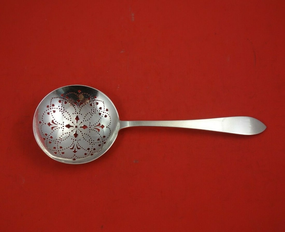 Tiffany & Co Faneuil Sterling Silver Slotted Spoon 8 7/8 with Extra Piercing: Tiffany & Co Faneuil Sterling Silver Slotted Spoon 8 7/8 with Extra Piercing This exquisite pea spoon from Tiffany & Co. showcases the elegant Faneuil pattern, crafted from high-quality sterling silve