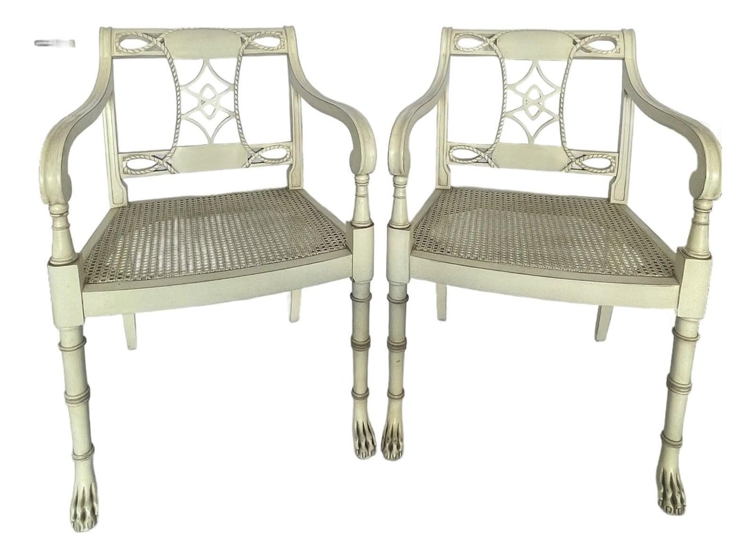 Set of Two Cane Seat Hollywood Regency Chairs with Paw Feet Cream: Set of Two Cane Seat Hollywood Regency Chairs with Paw Feet Cream This pair of Hollywood Regency style chairs features original cream-colored cane seats and distinctive paw feet. Crafted by Interior C