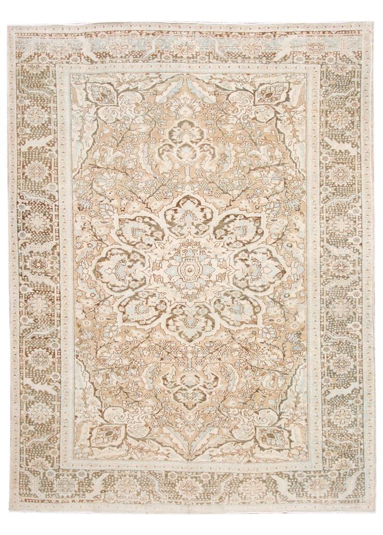 Vintage Early 20th Century Heriz Hand Knotted Wool Rug 8'8 x 12'7: Vintage Early 20th Century Heriz Hand Knotted Wool Rug 8'8 x 12'7 This exquisite early 20th century antique Heriz rug showcases a beautiful hand-knotted wool construction, featuring a warm tan field a