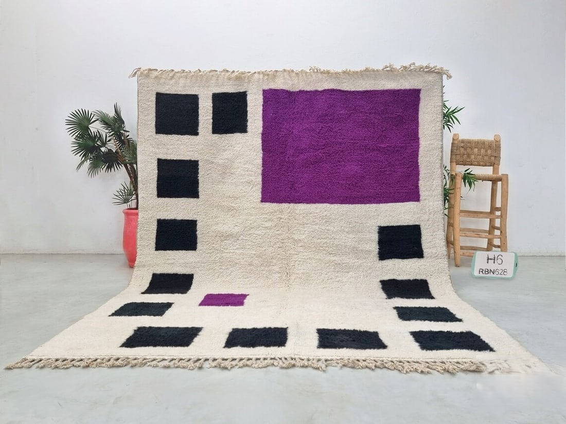 Authentic Handmade Wool Rug from Morocco 9.84 x 6.56 Feet: Authentic Handmade Wool Rug from Morocco 9.84 x 6.56 Feet Discover the beauty of this stunning, authentic handmade wool rug, meticulously handwoven in the Atlas Mountains by skilled local Berber women