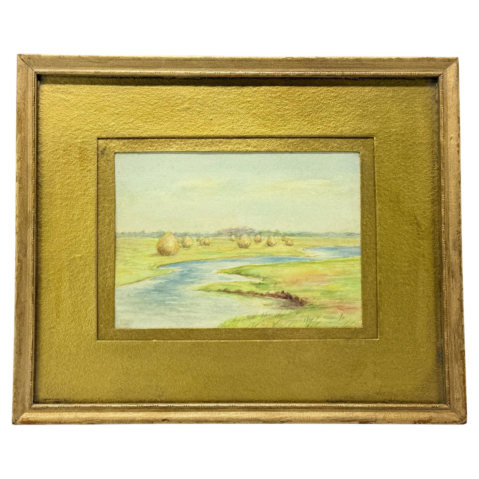 Antique Signed American Classical Watercolor Landscape with Giltwood Frame: Antique Signed American Classical Watercolor Landscape with Giltwood Frame This exquisite watercolor painting titled 'Hayfield by the River' captures a serene pastoral landscape, showcasing a gently w