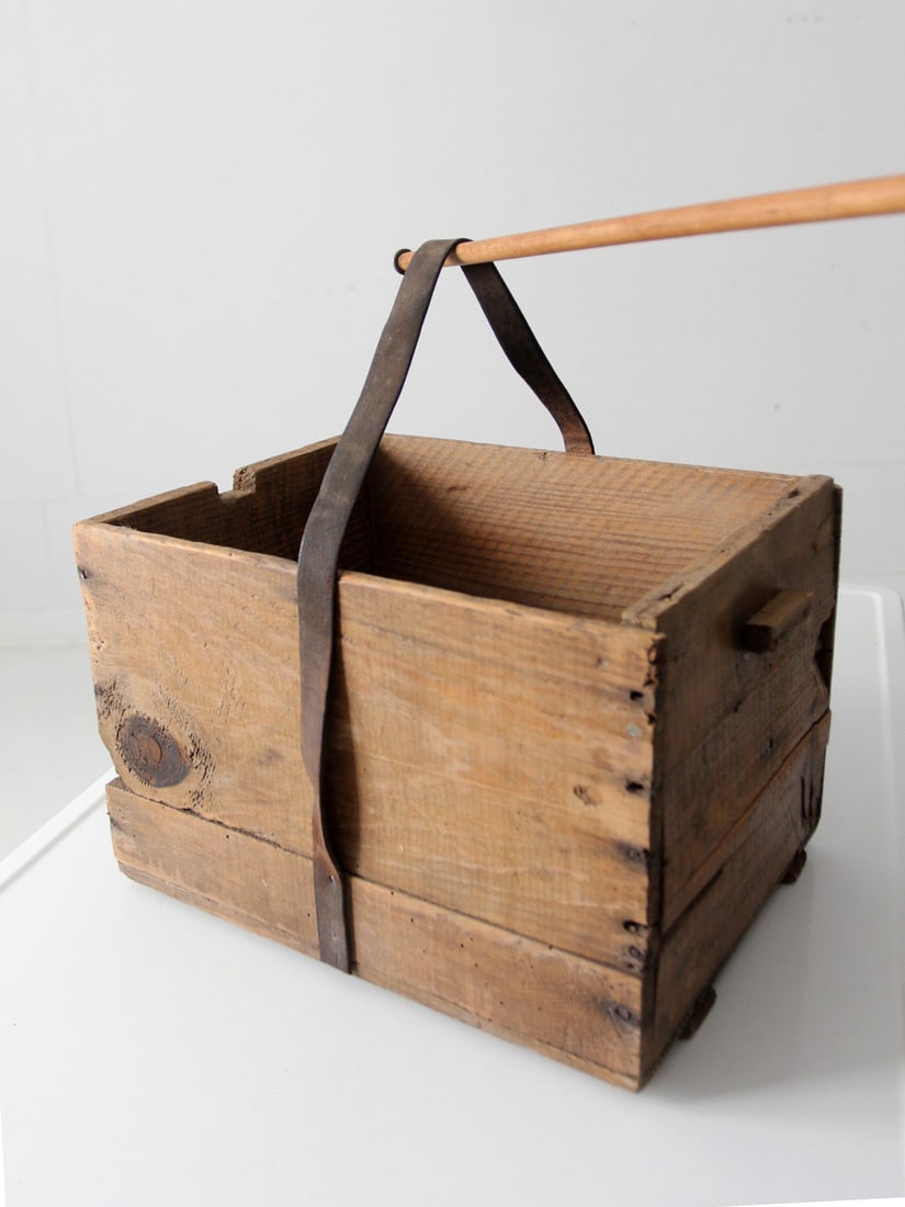 Early 20th Century Philadelphia Wooden Shipping Crate with Leather Strap: Early 20th Century Philadelphia Wooden Shipping Crate with Leather Strap This antique Philadelphia wood crate from the early 20th century showcases a unique blend of history and functionality. With it