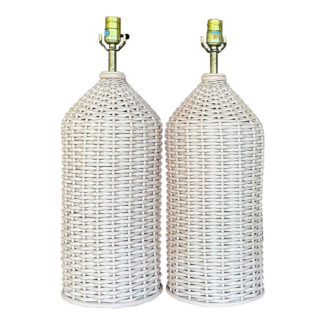 Chic Vintage Coastal Rattan Table Lamps Pair 23 Tall: Chic Vintage Coastal Rattan Table Lamps Pair 23 Tall This stunning pair of vintage Coastal table lamps brings a touch of chic elegance to any space. Crafted from woven rattan, these lamps feature a cl