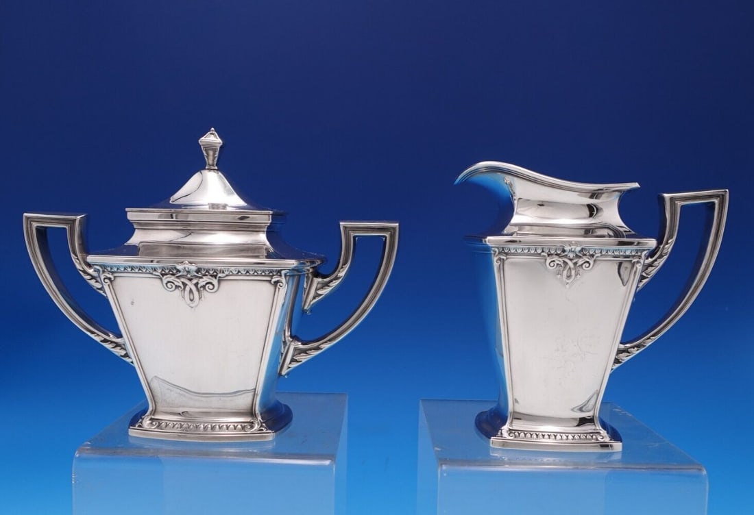 Trianon Sterling Silver Sugar and Creamer Set by International 2pc: Trianon Sterling Silver Sugar and Creamer Set by International 2pc Elevate your dining experience with this exquisite Trianon Sterling Silver Sugar and Creamer Set, crafted by International. This eleg