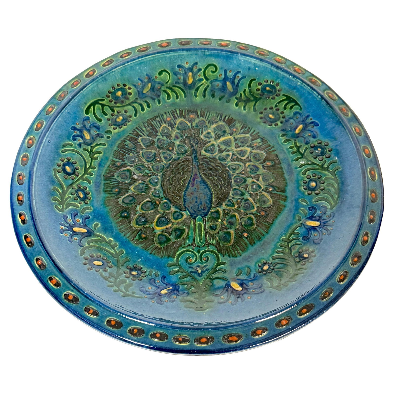 John Lang Welsh Arts & Crafts Peacock Charger 12.5 Inch Circa 1910-1925: John Lang Welsh Arts & Crafts Peacock Charger 12.5 Inch Circa 1910-1925 Discover a stunning Welsh Arts & Crafts Peacock Charger created by renowned studio potter John Lang from Aberamffra, dating from