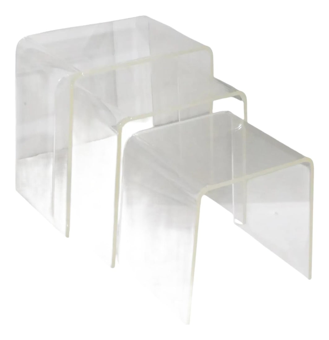 1970s Italian Solid Lucite Nesting Tables Set of 3: 1970s Italian Solid Lucite Nesting Tables Set of 3 This chic set of three graduated nesting tables is crafted from solid lucite and showcases a timeless design from Italy, circa 1970s. The transparent