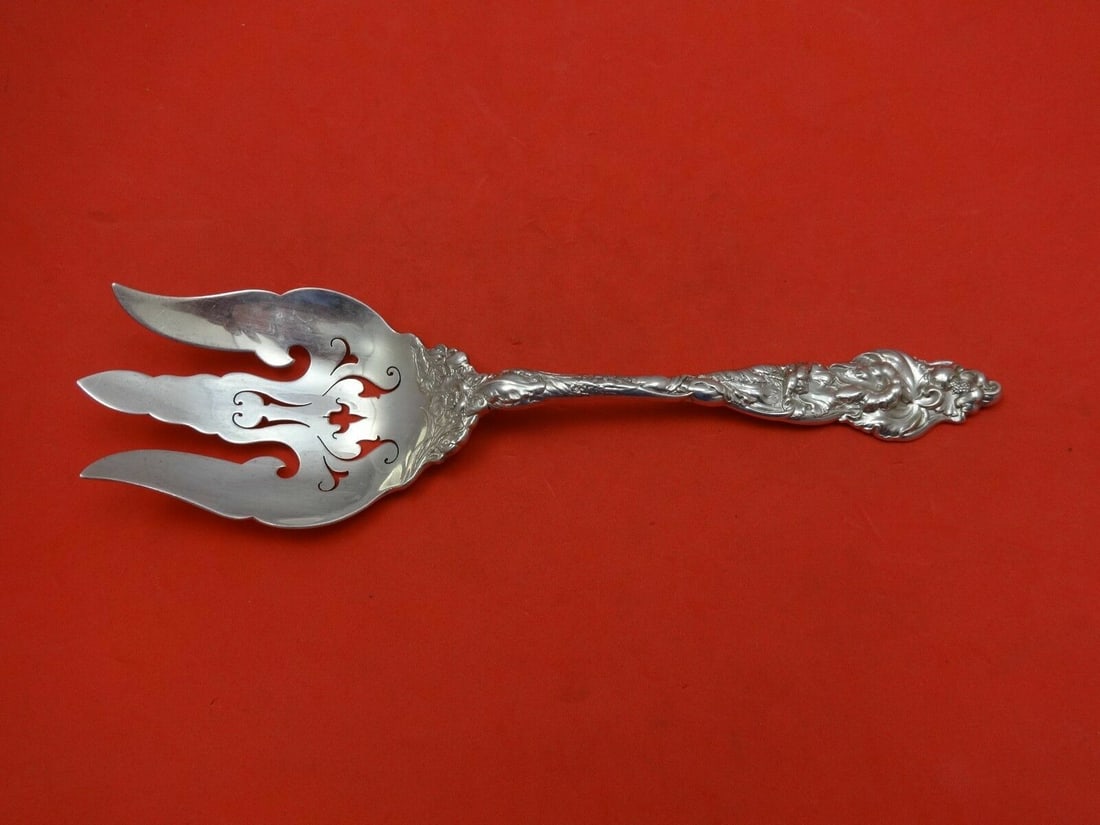 Reed and Barton Les Six Fleurs Sterling Silver Salad Serving Fork 9 5/8": Reed and Barton Les Six Fleurs Sterling Silver Salad Serving Fork 9 5/8" This exquisite salad serving fork is part of the Les Six Fleurs pattern by Reed and Barton, crafted from high-quality sterling 