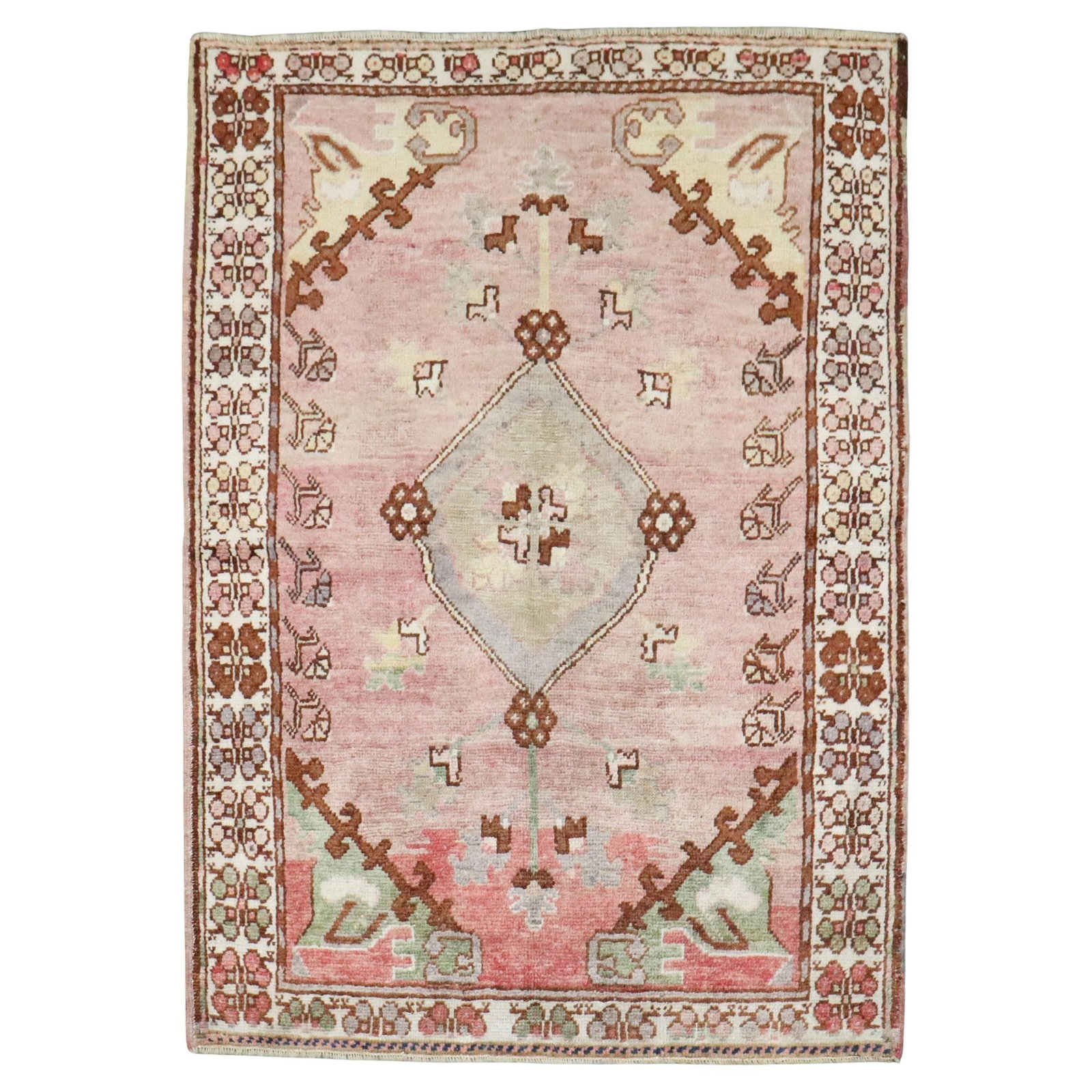 Vintage Pink Turkish Daizkare Wool Rug 3'3" x 4'3": Vintage Pink Turkish Daizkare Wool Rug 3'3" x 4'3" This mid-20th-century Turkish Daizkare rug features a pink tone and rustic style. Hand-woven from wool, it is a small square rug originating from Tur