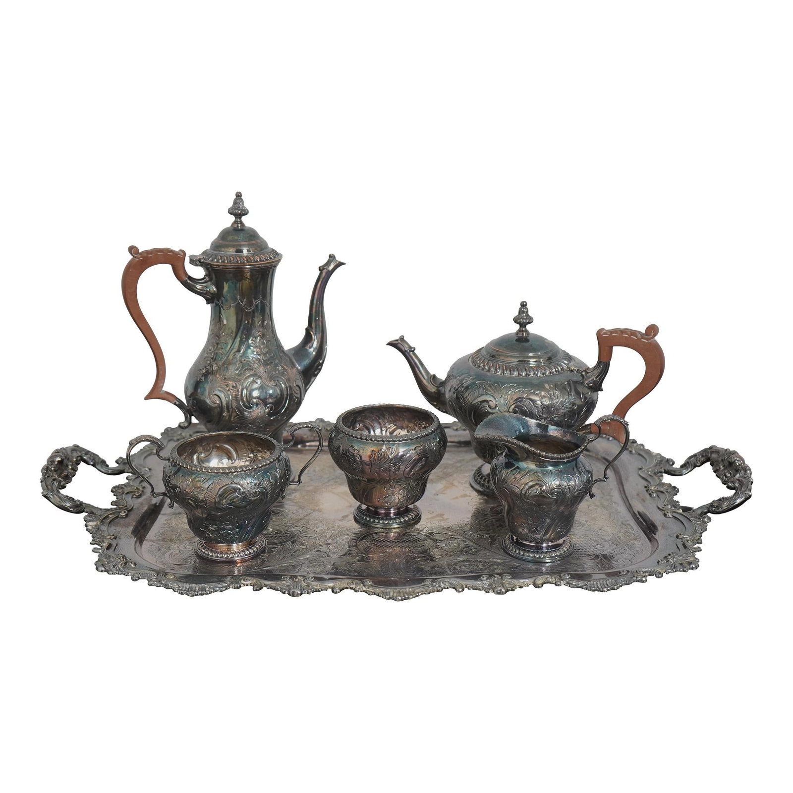 Vintage 6 Piece Silverplate Tea Set Made in England: Vintage 6 Piece Silverplate Tea Set Made in England This exquisite 6-piece silverplate tea set showcases the timeless elegance and craftsmanship made in England approximately 50 years ago. The set inc