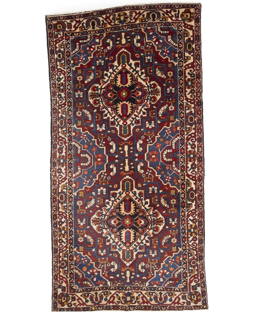 Hand-Knotted Vintage Floral Tribal 5'2 x 10'1 Wool Runner Rug: Hand-Knotted Vintage Floral Tribal 5'2 x 10'1 Wool Runner Rug This exquisite hand-knotted vintage Oriental runner features a stunning floral tribal design, showcasing an array of colors including red,