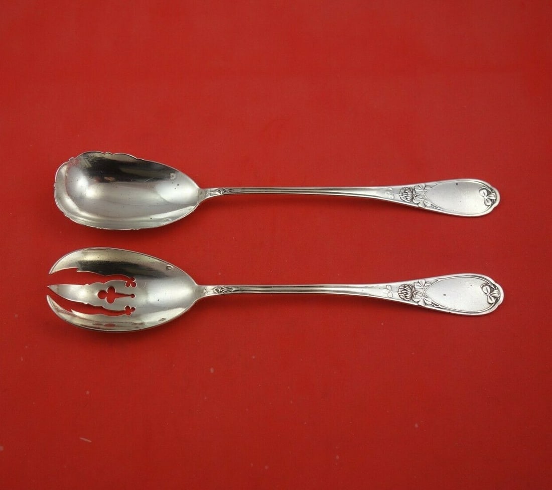Page Brothers French Sterling Silver 2pc Salad Serving Set with Clover: Page Brothers French Sterling Silver 2pc Salad Serving Set with Clover This exquisite 2-piece salad serving set by Page Brothers showcases the elegance of French craftsmanship in sterling silver. Each