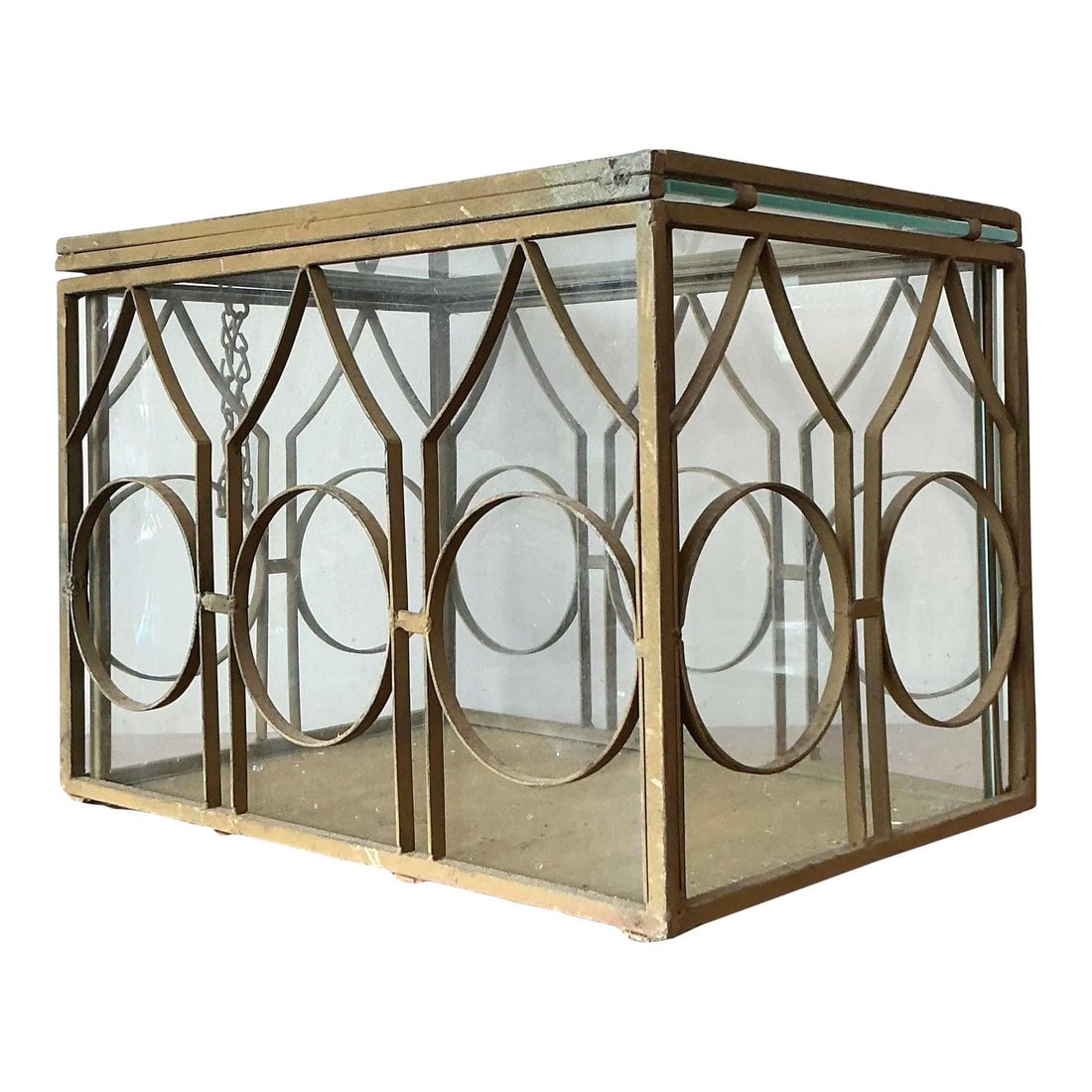 Hollywood Regency Brass and Glass Terrarium with Wrought Iron Frame 11 x 15.75 x 10.75: Hollywood Regency Brass and Glass Terrarium with Wrought Iron Frame 11 x 15.75 x 10.75 This vintage Hollywood Regency terrarium features a wrought iron frame with a warm brass patina finish and intric