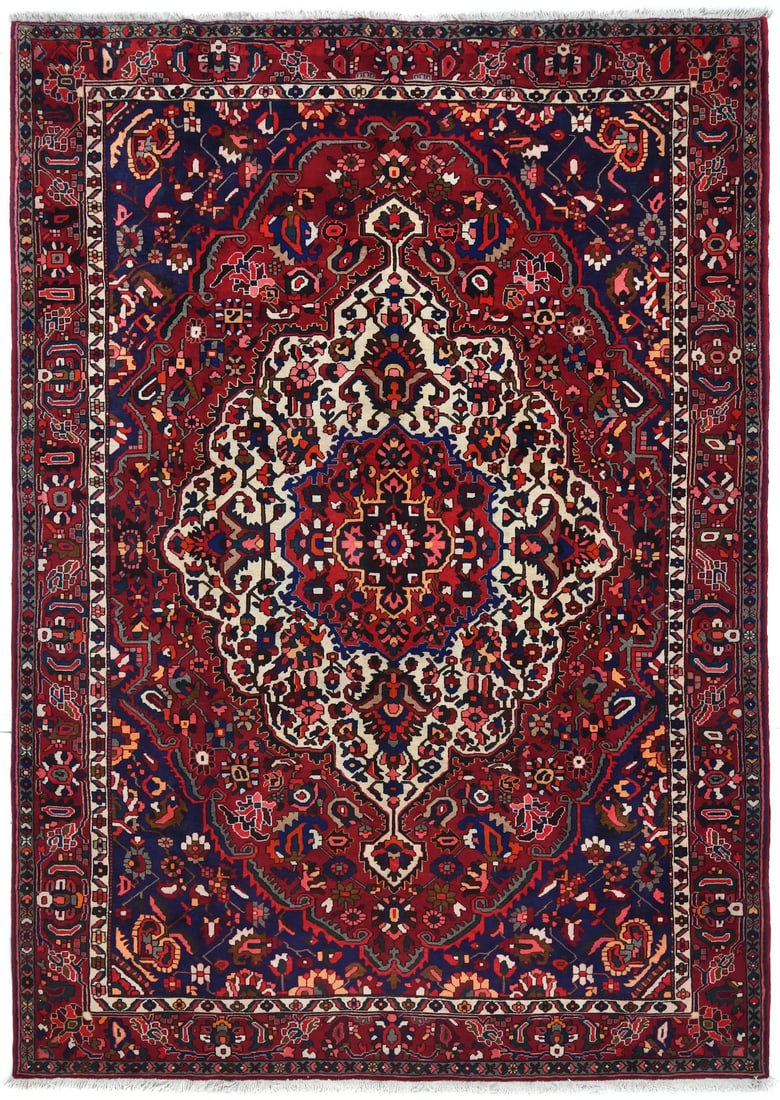 Handmade Vintage Floral Wool Oriental Rug 8'6 x 11'11: Handmade Vintage Floral Wool Oriental Rug 8'6 x 11'11 Enhance your living space with this stunning handmade Oriental rug, featuring a beautiful floral design that complements both farmhouse and tradit