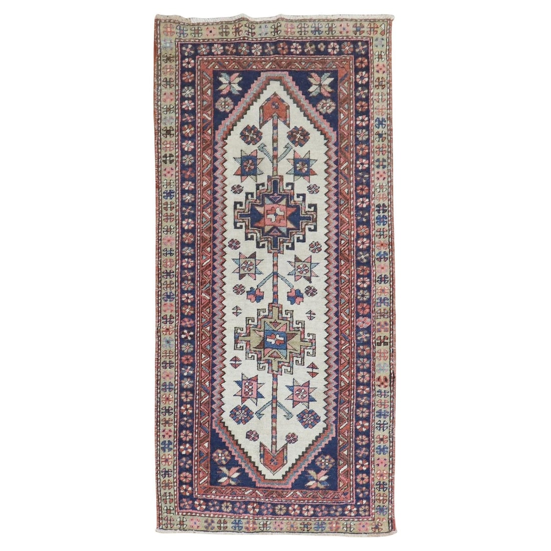 Zabihi Collection Hand-Woven Ivory Tribal Heriz Runner 35 x 71: Zabihi Collection Hand-Woven Ivory Tribal Heriz Runner 35 x 71 This exquisite small runner from the Zabihi Collection features a stunning ivory field adorned with a tribal geometric pattern, showcasin
