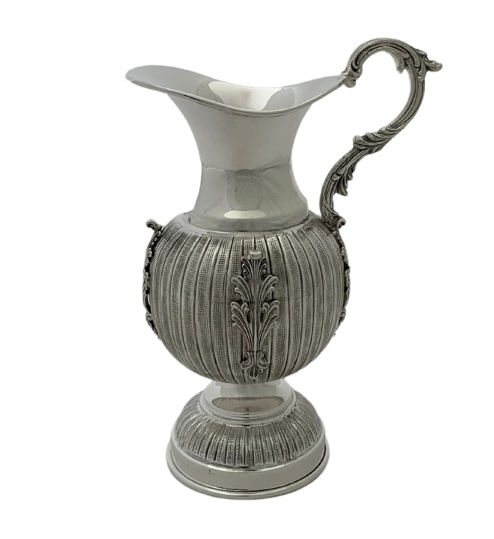 Handmade 925 Sterling Silver Oil Pitcher with Leaf Applique: Handmade 925 Sterling Silver Oil Pitcher with Leaf Applique This exquisite oil pitcher is crafted from fine 925 sterling silver, showcasing a beautiful handmade leaf applique design with striated patt