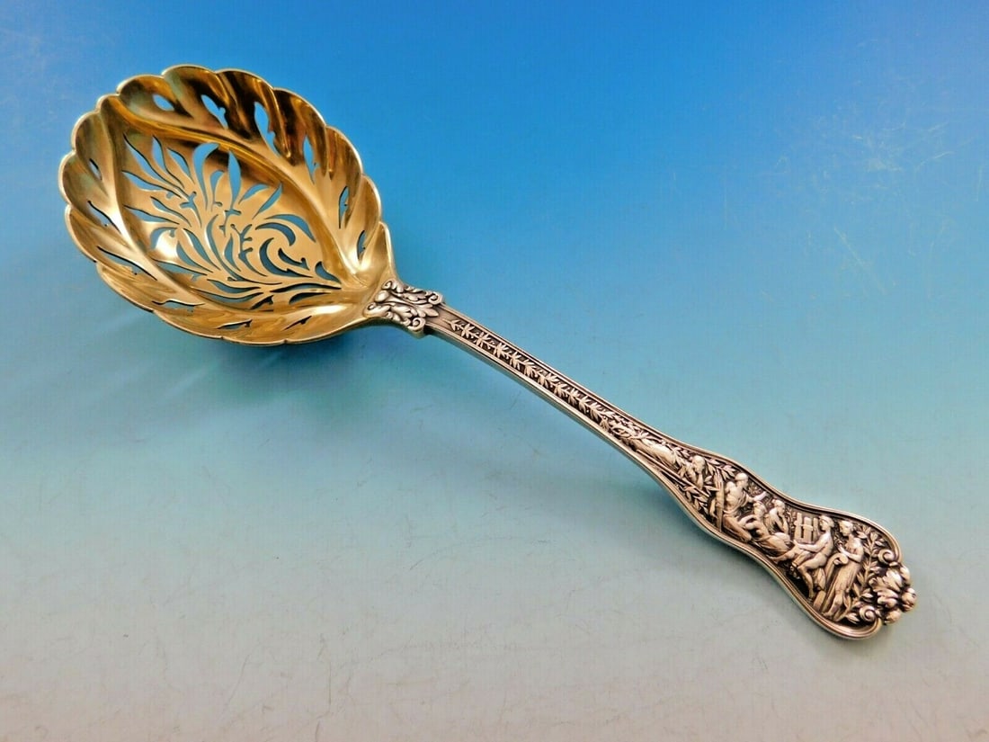 Sterling Silver Sugar Sifter Olympian Pattern Figural Motif by Tiffany 7 Inch: Sterling Silver Sugar Sifter Olympian Pattern Figural Motif by Tiffany 7 Inch This is a masterfully crafted sterling silver sugar sifter in the Olympian pattern by Tiffany & Co., introduced in 1878. R