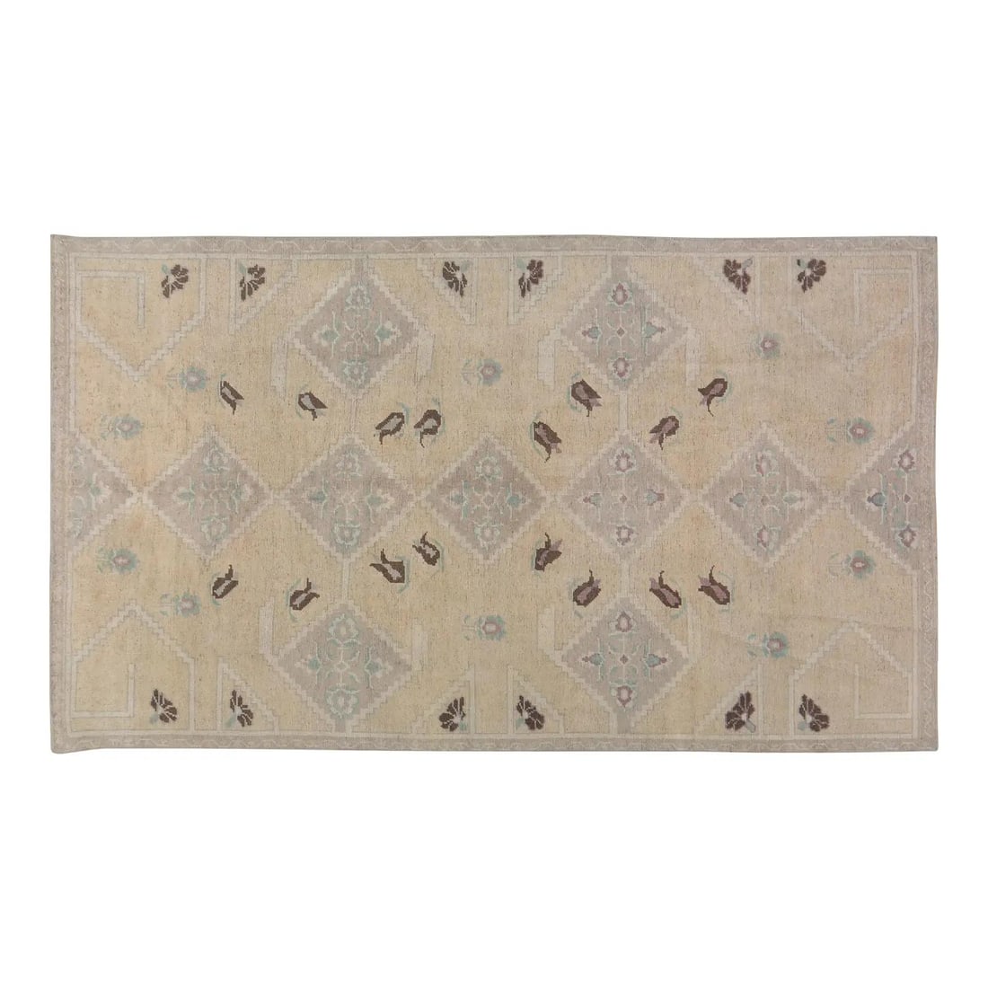 Anatolian Wool Area Rug Hand Knotted Vintage 5'3" x 9': Anatolian Wool Area Rug Hand Knotted Vintage 5'3" x 9' This vintage Turkish Anatolian rug features a hand-knotted wool construction with natural colors. The rug showcases a tan color palette and is pr