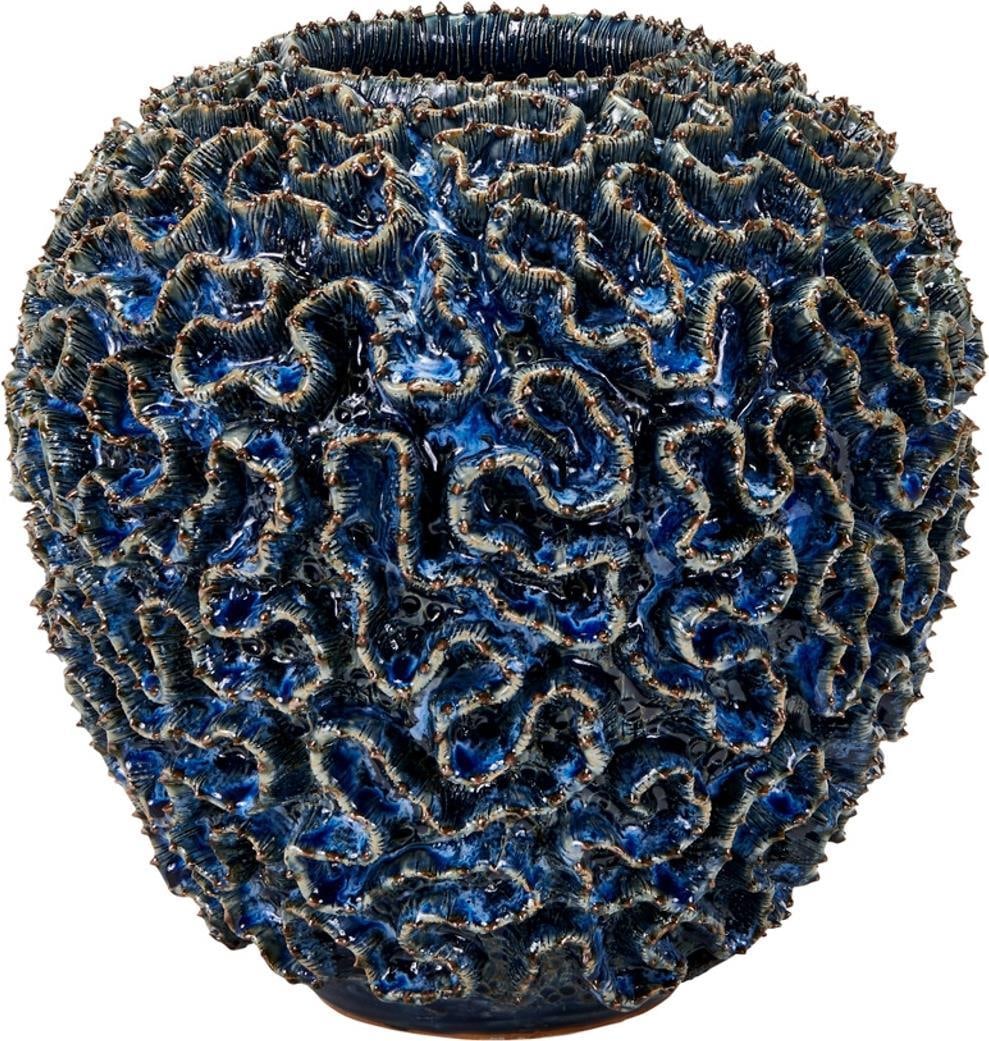 Handmade Marine Blue Vase with Coral Design 12H x 11W x 11D: Handmade Marine Blue Vase with Coral Design 12H x 11W x 11D This stunning marine blue vase features intricate coral details, showcasing a beautiful ocean blue finish. Handmade with care, this medium-s