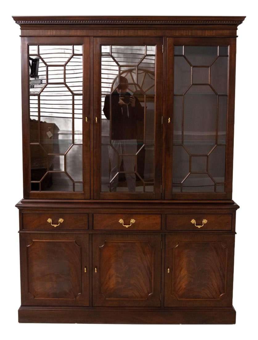 Mahogany Chippendale Breakfront Cabinet with Three Glass Doors by Stickley: Mahogany Chippendale Breakfront Cabinet with Three Glass Doors by Stickley This Stickley breakfront features three doors and showcases a Chippendale style design, crafted from mahogany with a Number 9