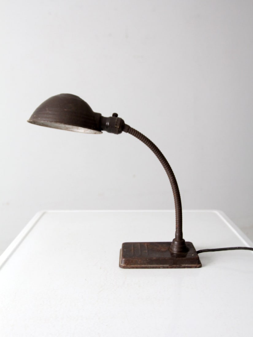 Vintage Art Deco Gooseneck Desk Lamp Metal Adjustable Lighting: Vintage Art Deco Gooseneck Desk Lamp Metal Adjustable Lighting This vintage brown gooseneck desk lamp features a sleek Art Deco design, crafted from metal with a rectangular base. Its flexible goosene
