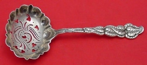 Tiffany and Co Ailanthus Sterling Silver Sugar Sifter 5 3/4 inches Monogrammed: Tiffany and Co Ailanthus Sterling Silver Sugar Sifter 5 3/4 inches Monogrammed This exquisite sugar sifter from Tiffany & Co. features the elegant Ailanthus pattern, crafted from high-quality sterling