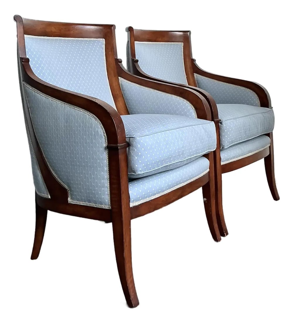 Pair of Vintage Empire Style Neoclassical Lounge Armchairs With Blue Upholstery: Pair of Vintage Empire Style Neoclassical Lounge Armchairs With Blue Upholstery This pair of vintage Regency Empire lounge chairs features elegant Neoclassical design with continuous exposed wood fram