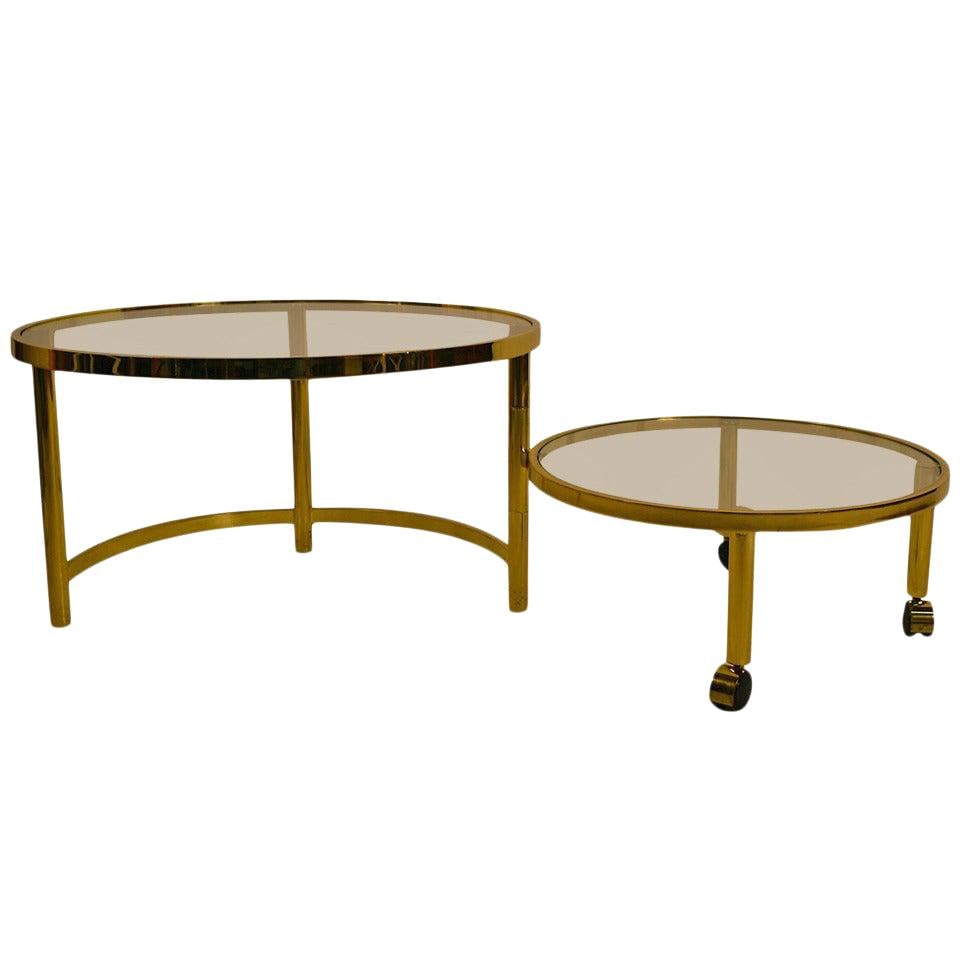 Brass Plated Mechanical Disk Coffee Table with Glass Tops: Brass Plated Mechanical Disk Coffee Table with Glass Tops This unique mechanical disk table features a stylish design that transforms into a two-tier coffee table, perfect for both functionality and a
