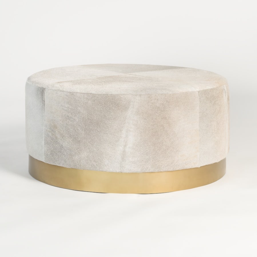 Jordan Ottoman by Alder Tweed Transitional Leather and Stainless Steel: Jordan Ottoman by Alder Tweed Transitional Leather and Stainless Steel Introducing the Jordan Ottoman, a perfect blend of comfort and style. This ottoman is designed in a transitional style, featuring