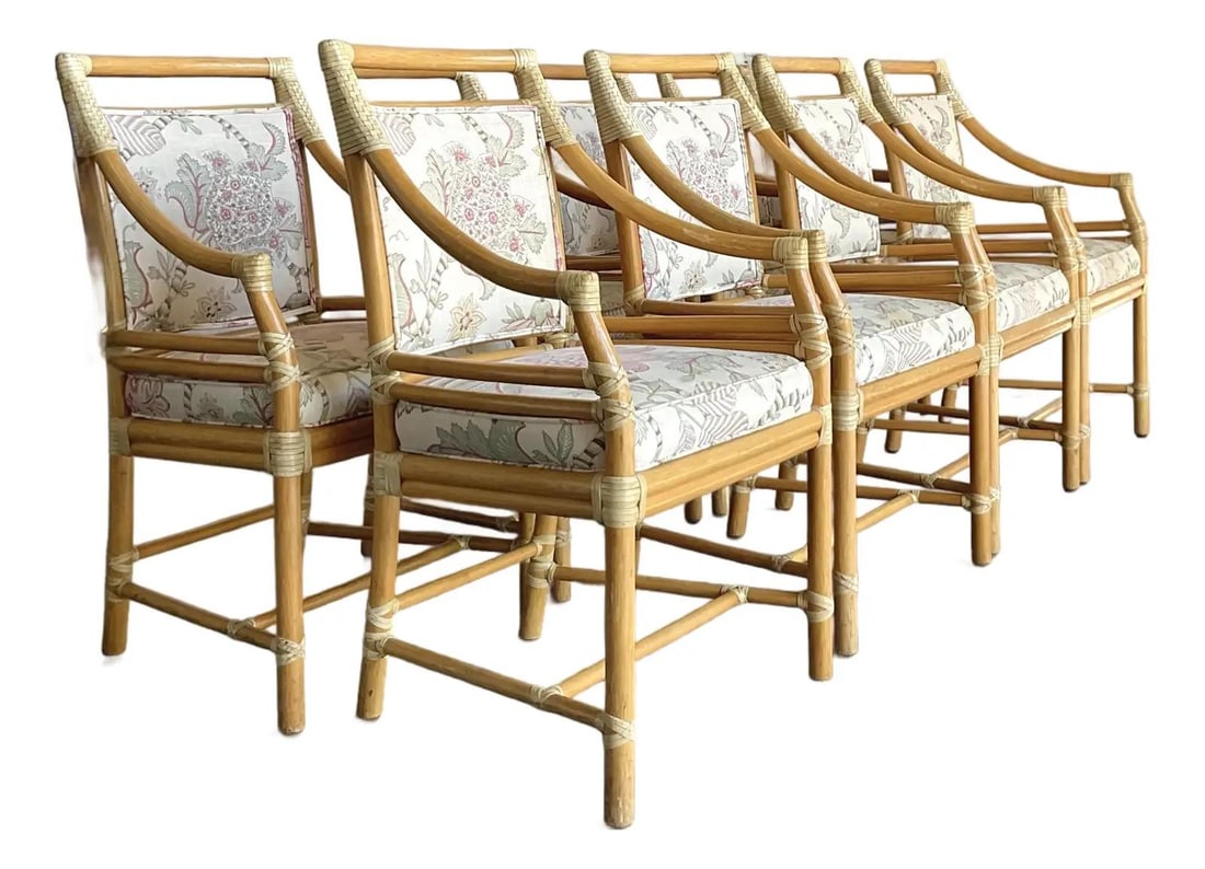 Set of 8 Rattan Target Back Dining Chairs with Upholstered Cushions: Set of 8 Rattan Target Back Dining Chairs with Upholstered Cushions This set of eight vintage McGuire target back dining chairs embodies the relaxed elegance of Hollywood Regency and Coastal styles. C